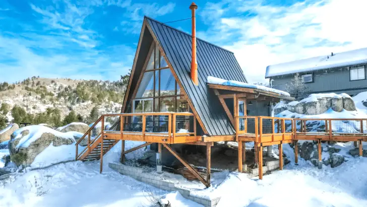 The Outside Of This Amazing A-Frame Cabin For Two Looks Breathtaking