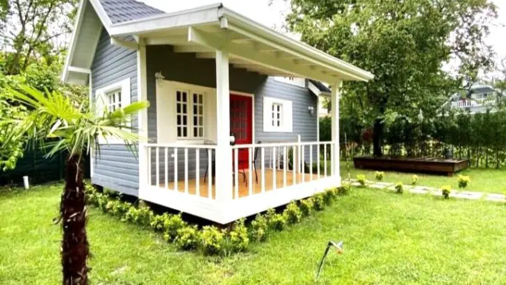 Cute Tiny House With Red Door And Beautiful Views