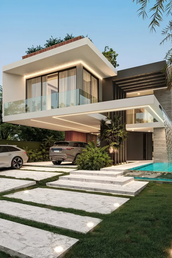 Modern house with floating upper level, glass walls, cascading waterfall, tropical landscaping, and minimalist stone pathway.