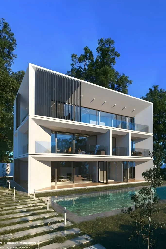 Modern three-story house with large glass windows, open balconies, and a private pool surrounded by lush landscaping, reflecting a minimalist and tranquil architectural design.