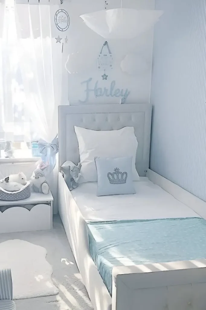 Soft blue and white small bedroom with tufted bed, cozy decor, and calming pastel accents.