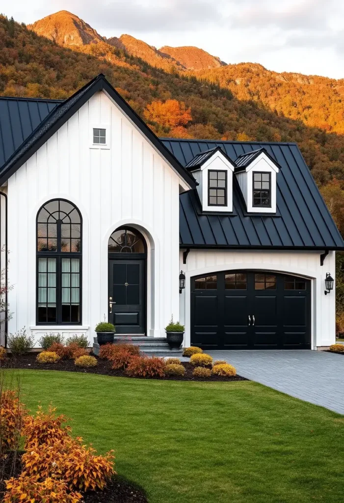 Black-and-white modern house with arched windows, bold accents, and autumn mountain backdrop.