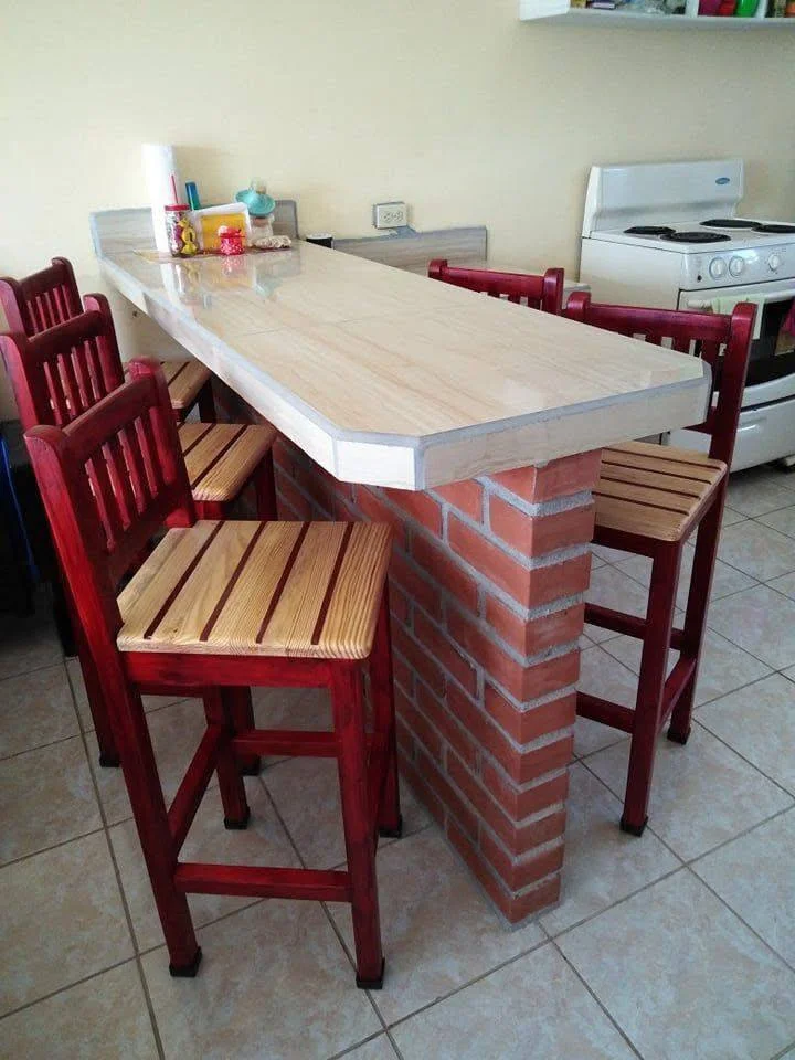 DIY brick kitchen island with wooden countertop.