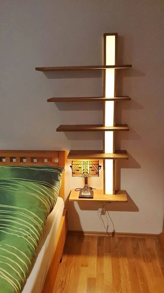 DIY floating bedside shelves with integrated lighting.