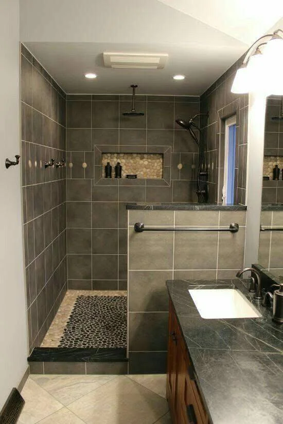 DIY tiled shower niche for shampoo and soap storage.