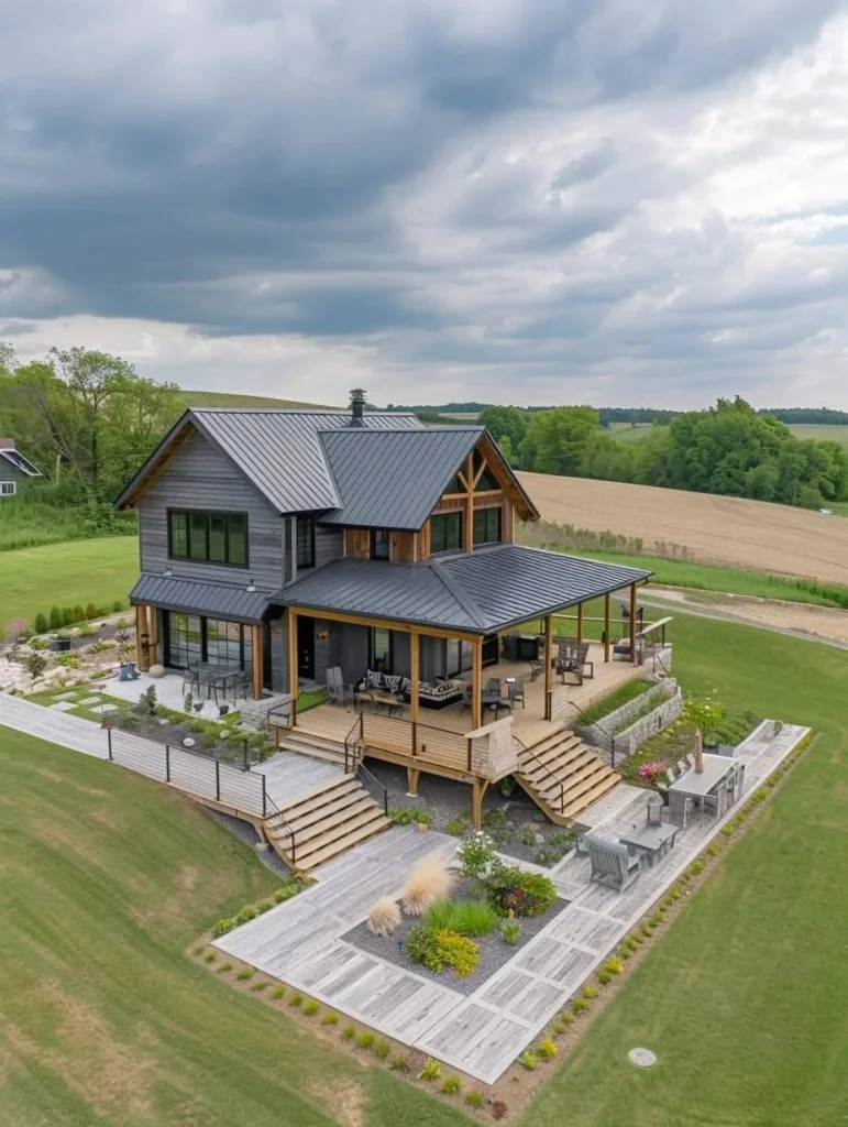 Farmhouse with multi-level decks and mixed material exterior.