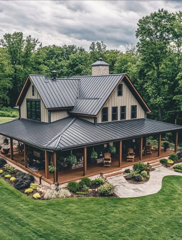 Farmhouse with wrap-around porch and detailed landscaping.