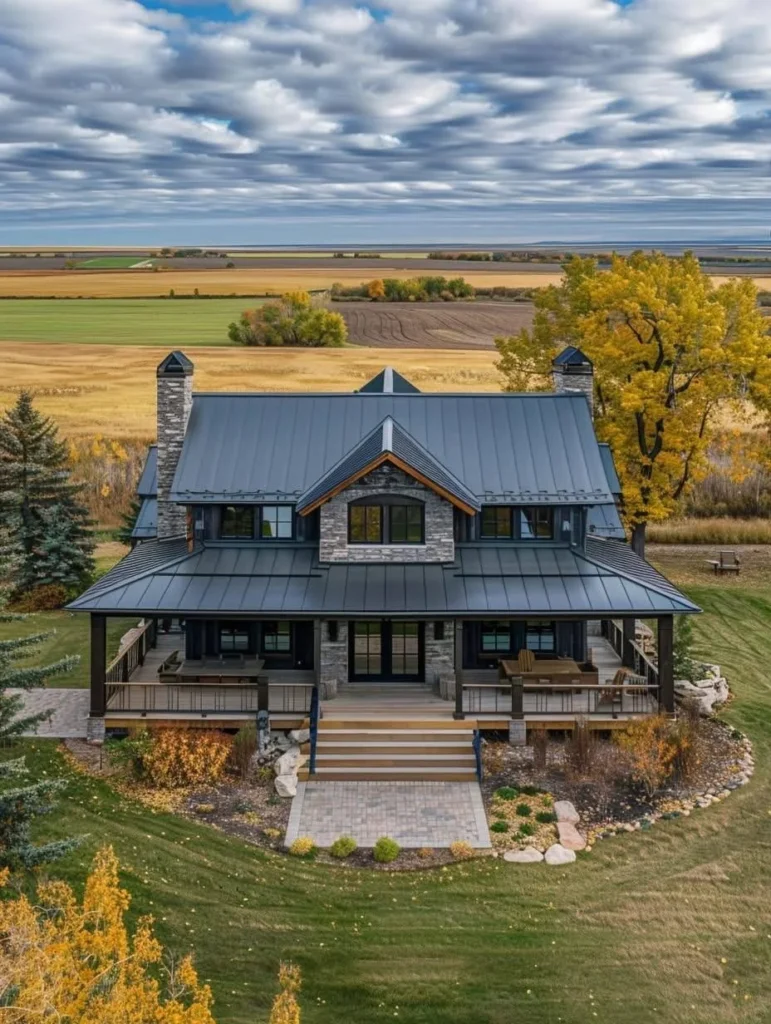 Barndominium farmhouse with metal roof and wrap-around porch.