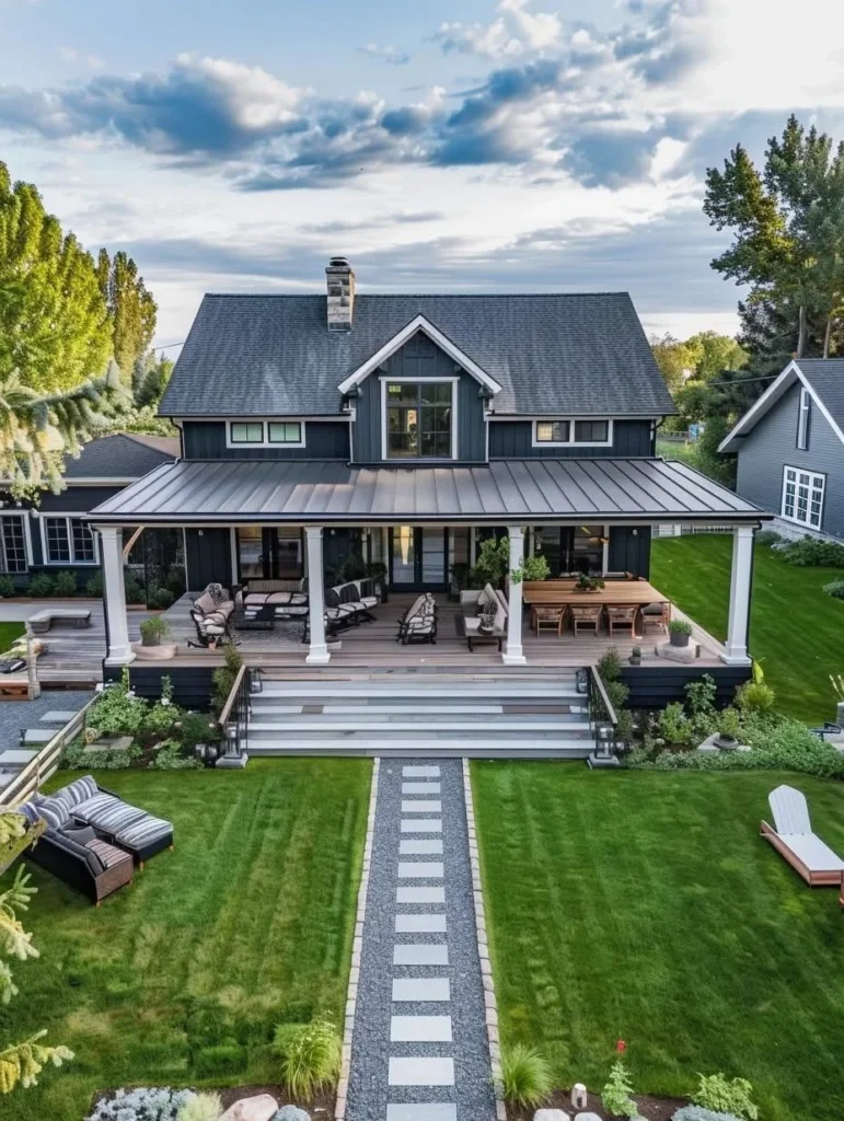 Modern farmhouse with wide front porch and stepping stone walkway.