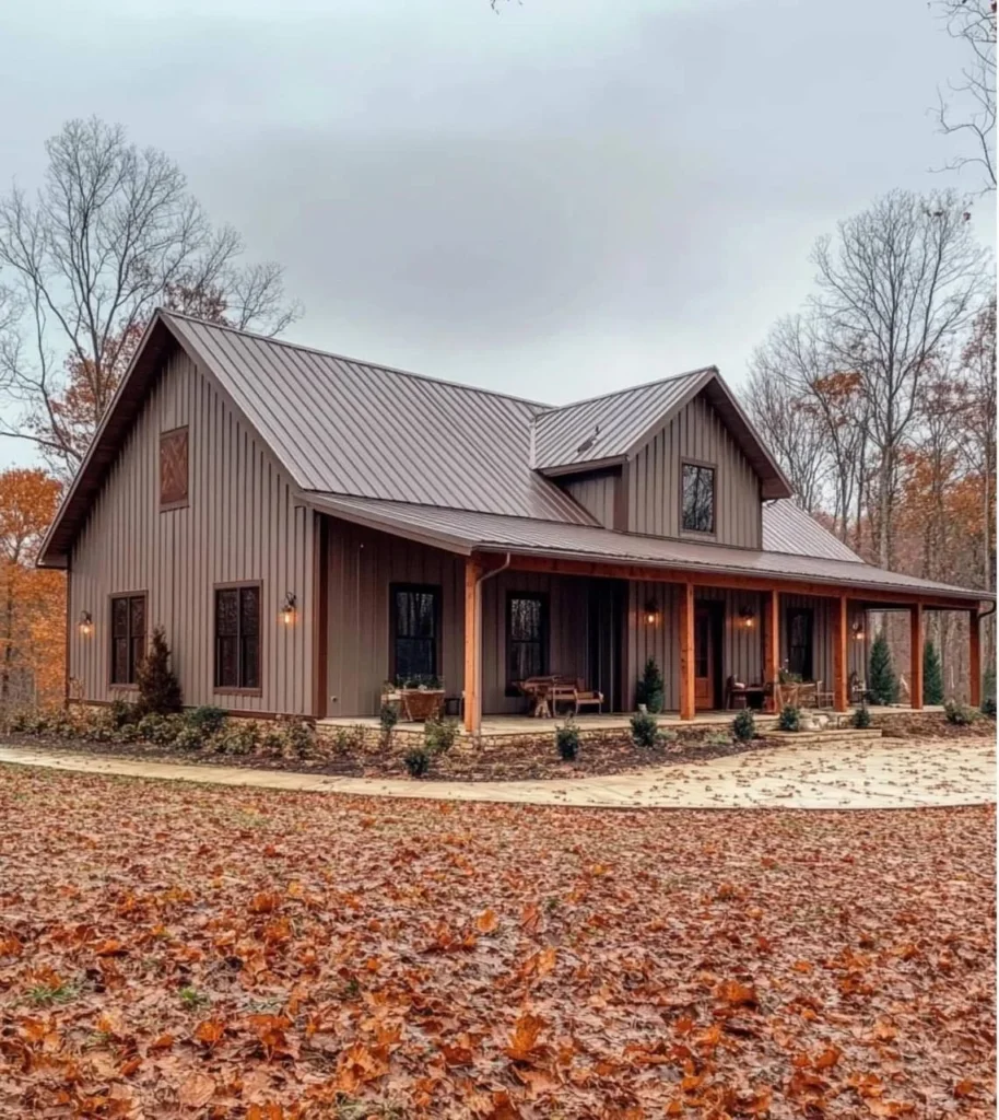 Metal-sided farmhouse with covered porch.