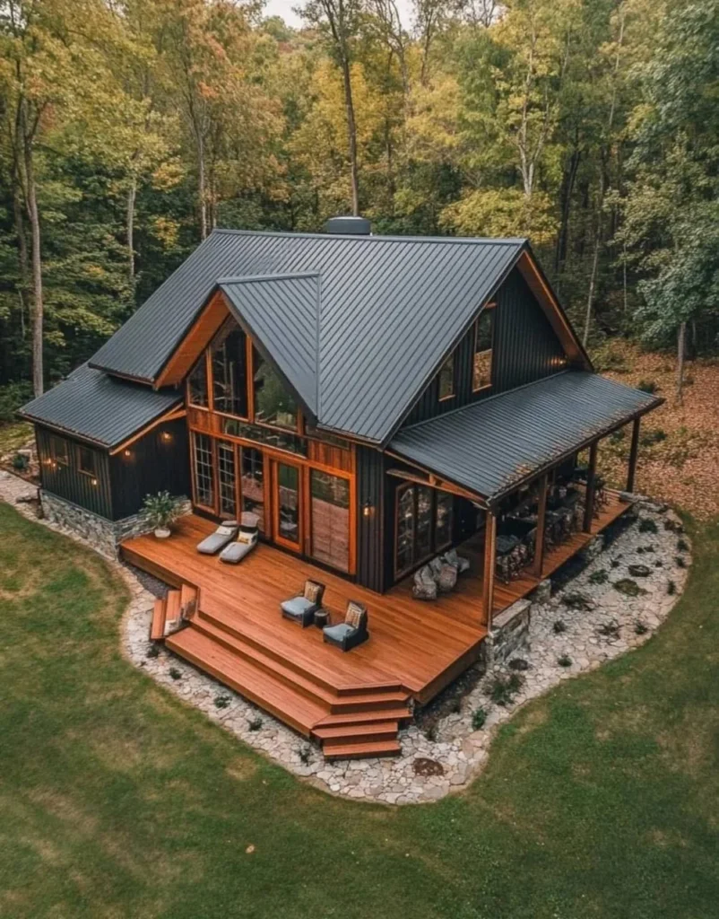 Modern farmhouse with large deck and dark siding.