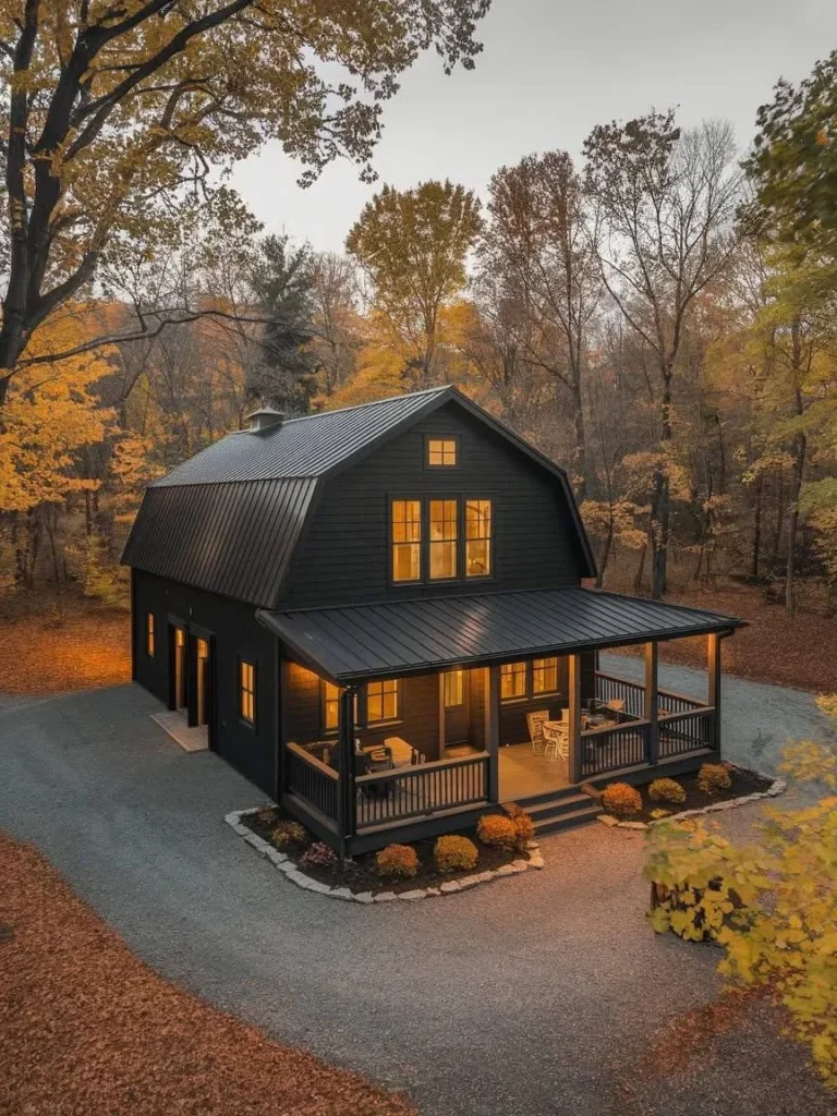 Modern Barndominium Exterior with all-black siding and a gambrel roof.