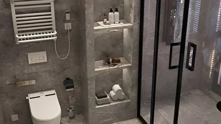 Modern bathroom wall with marble-effect, recessed shelves, and LED lighting.