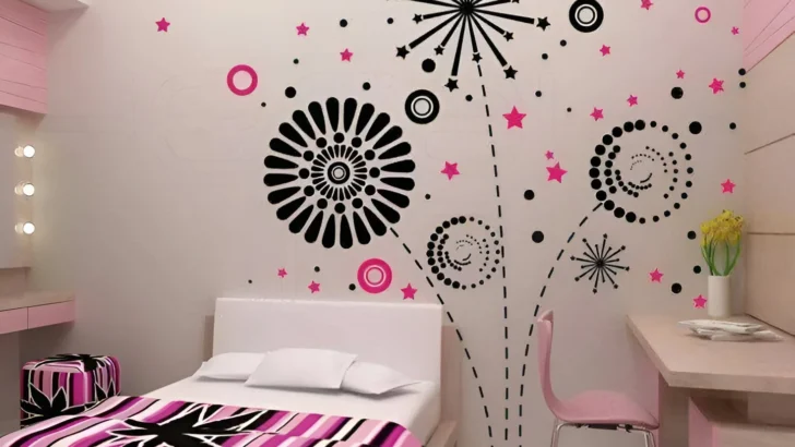 Bedroom wall with black and pink geometric firework-inspired wall decals.