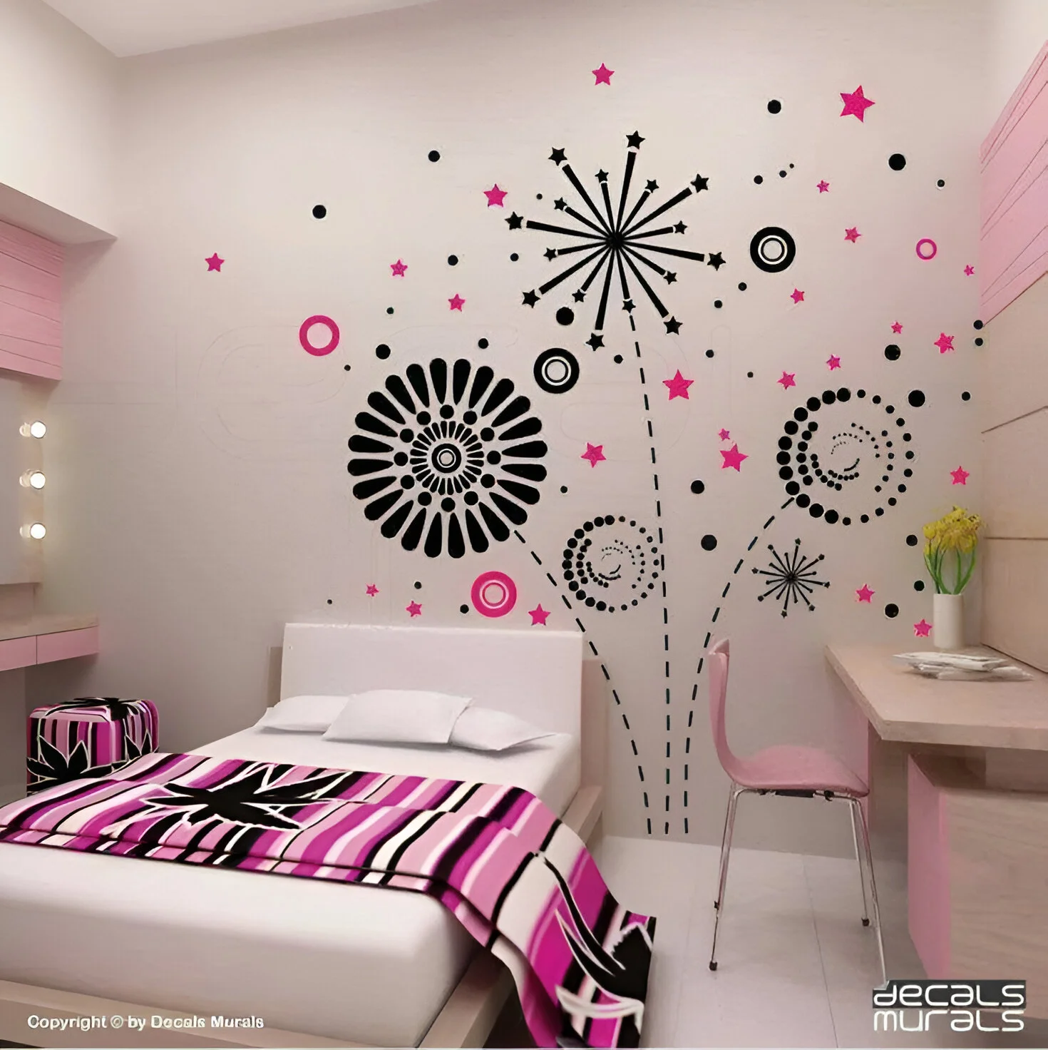 Bedroom wall with black and pink geometric firework-inspired wall decals.