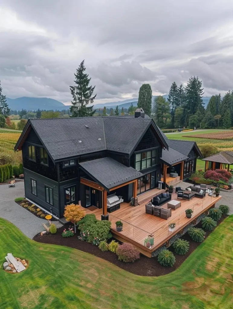 Modern countryside home with large outdoor deck design.