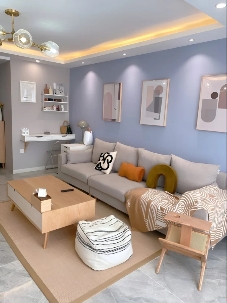 Pastel-themed gallery wall for a serene and stylish small living room.