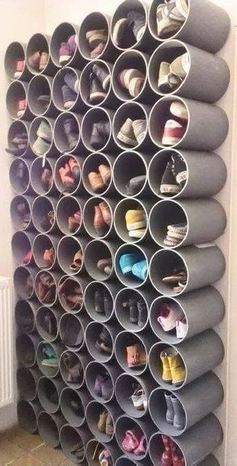 DIY shoe rack made from PVC pipes for closet organization.