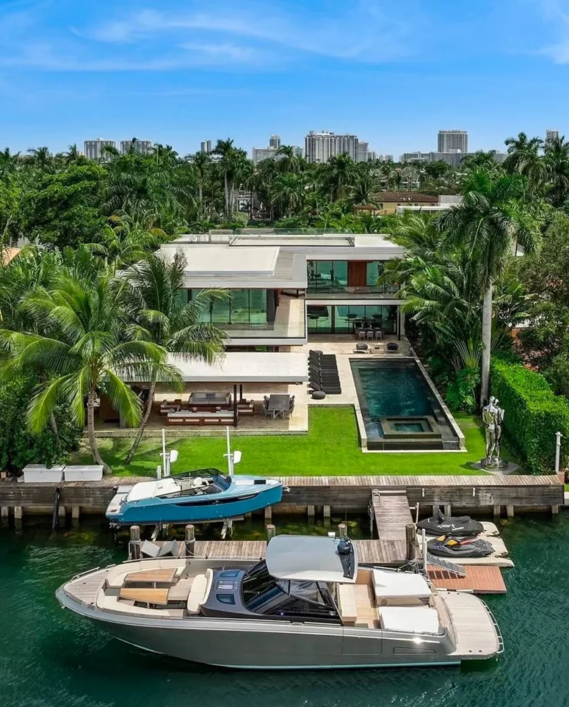 Luxury dream home exterior with modern architecture and waterfront access.