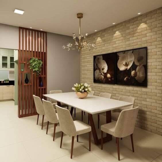 Modern dining room with wood slat partition and brick wall. - modern dining room ideas