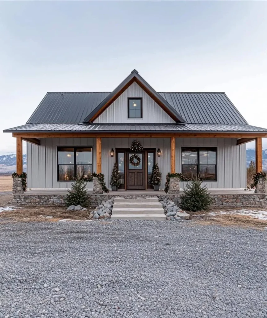 Small modern farmhouse with wood beams and stone accents.