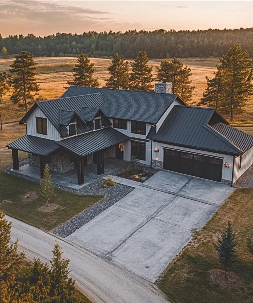 Modern farmhouse with standing seam metal roof and covered walkway.