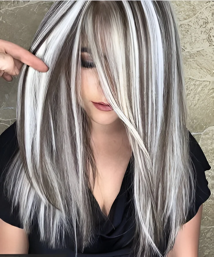 Platinum blonde highlights dark hair 2025 trend -  hair highlight ideas