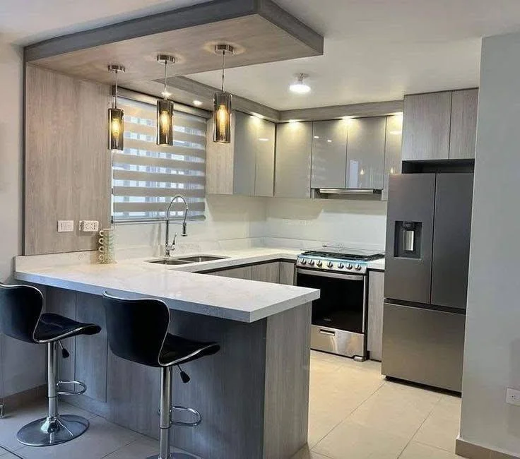 Kitchen with Dropped Ceiling Detail and Pendant Lights