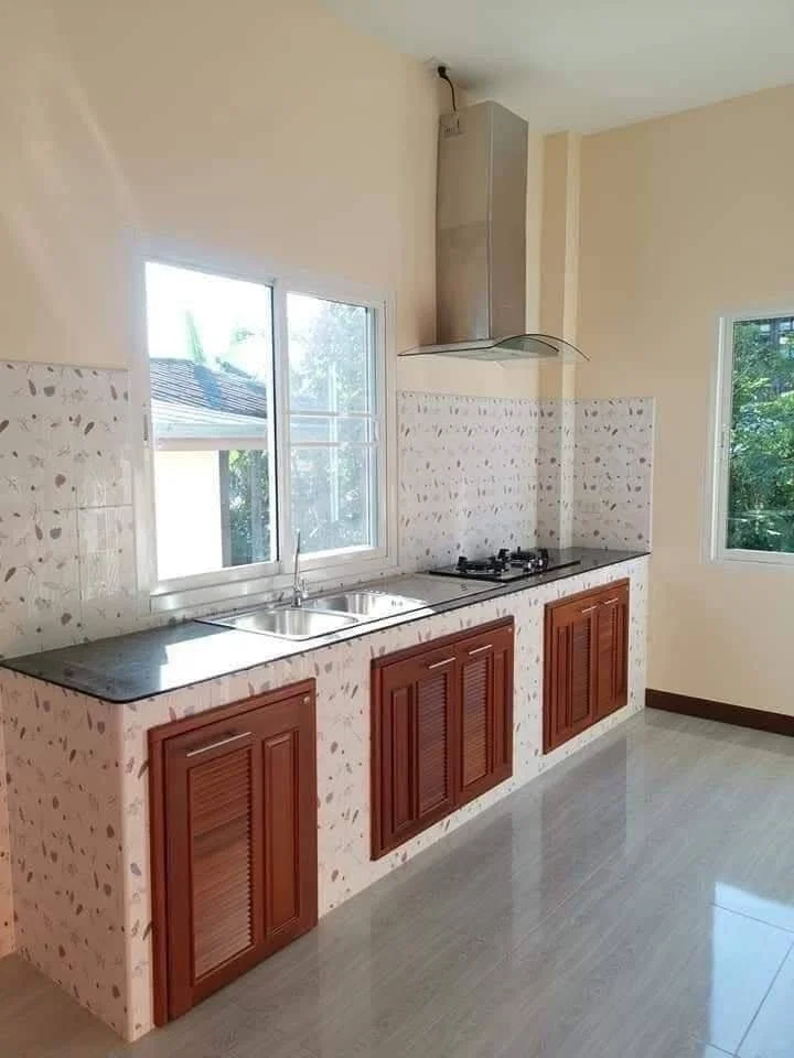 Kitchen with Full-Wall Tile Backsplash