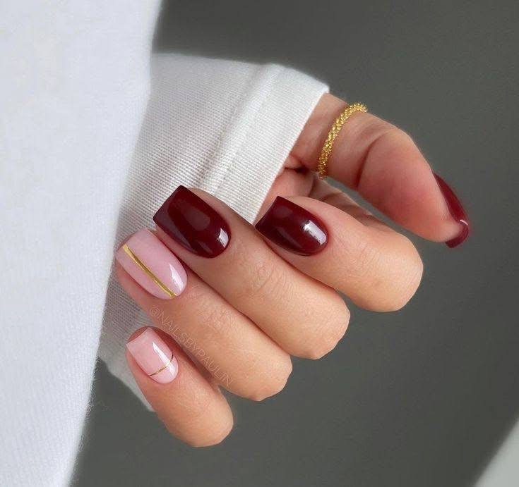 Burgundy and Pink Nails with Gold Stripe Accent - burgundy nail designs