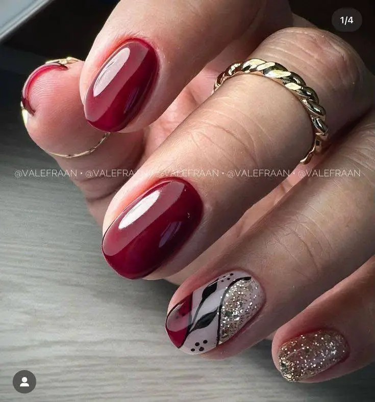 Burgundy Nails with Glitter and Abstract Art Accents