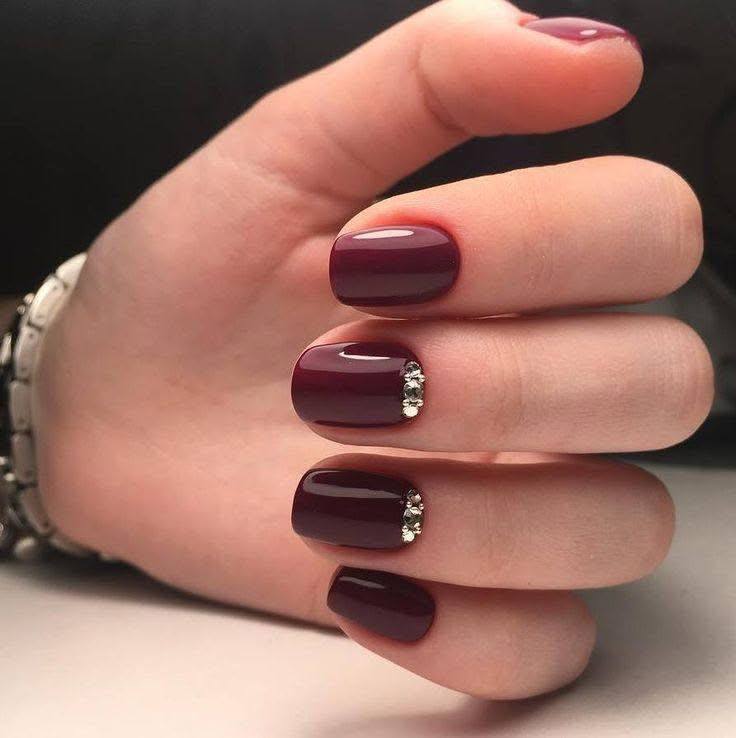 Short Burgundy Nails with Rhinestone Accents