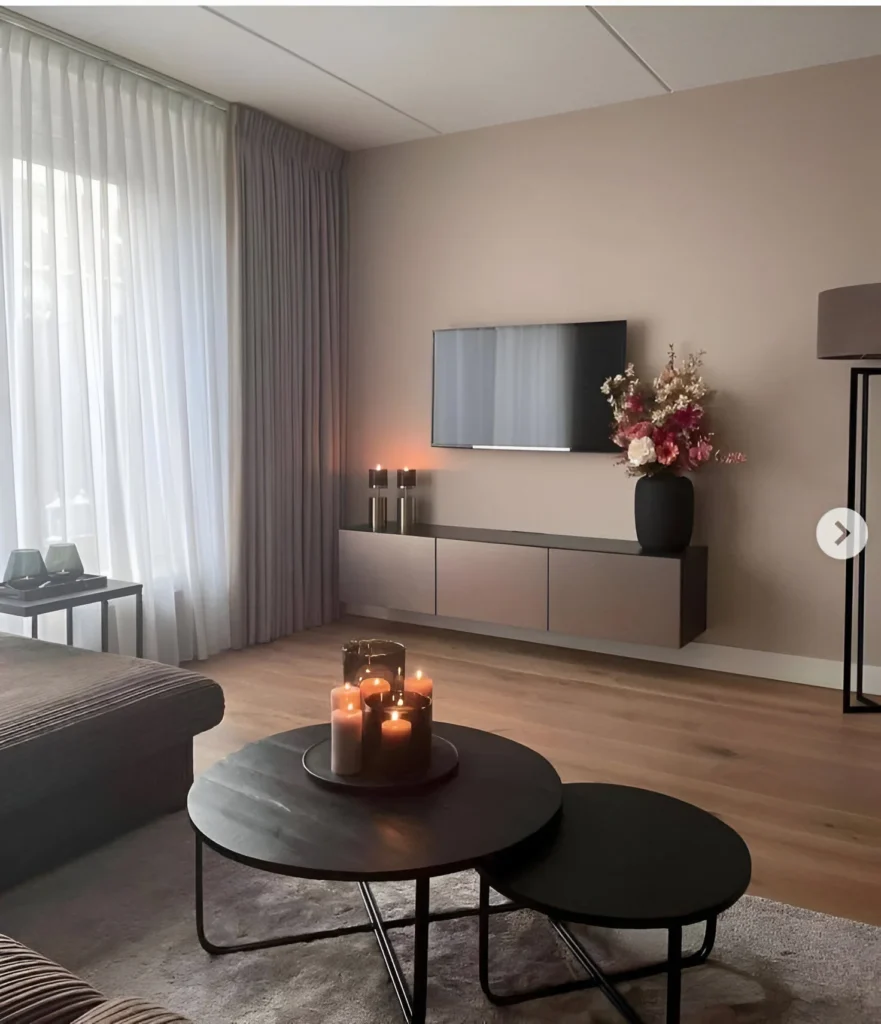 Living room with muted taupe walls and coordinated furnishings.