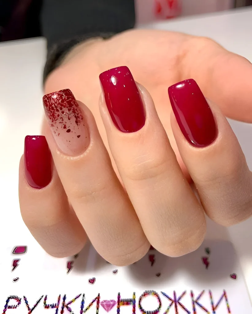 Bold ruby red nails with glitter accent  - trendy red nail designs