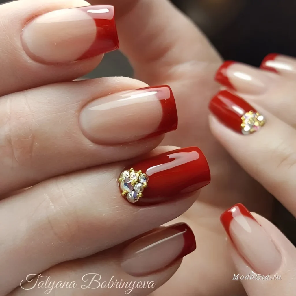 Modern red French manicure, a trending nail design for 2025.