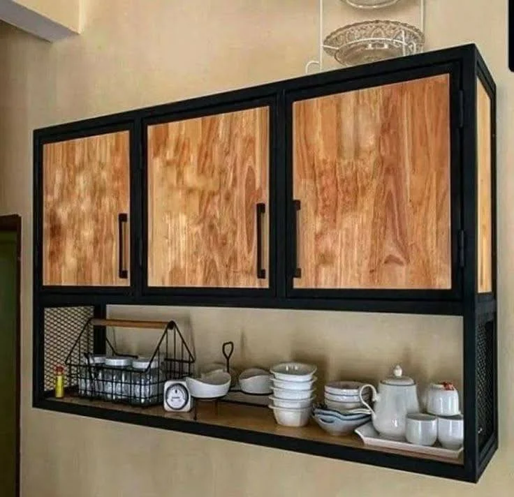 Floating shelves wall-mounted, displaying dishware, mugs, and decorative items above a kitchen counter.