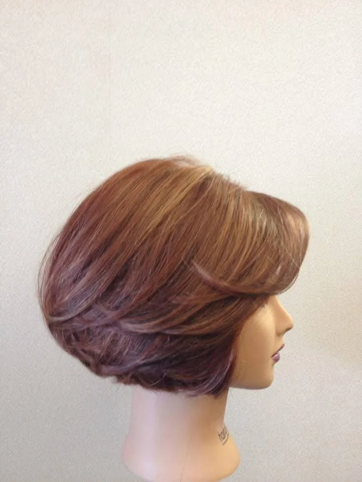 Voluminous layered bob, demonstrating how to add volume with short haircuts in 2025.