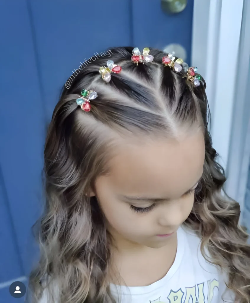 Glamorous hairstyles for little girls; zig-zag part with jewels.