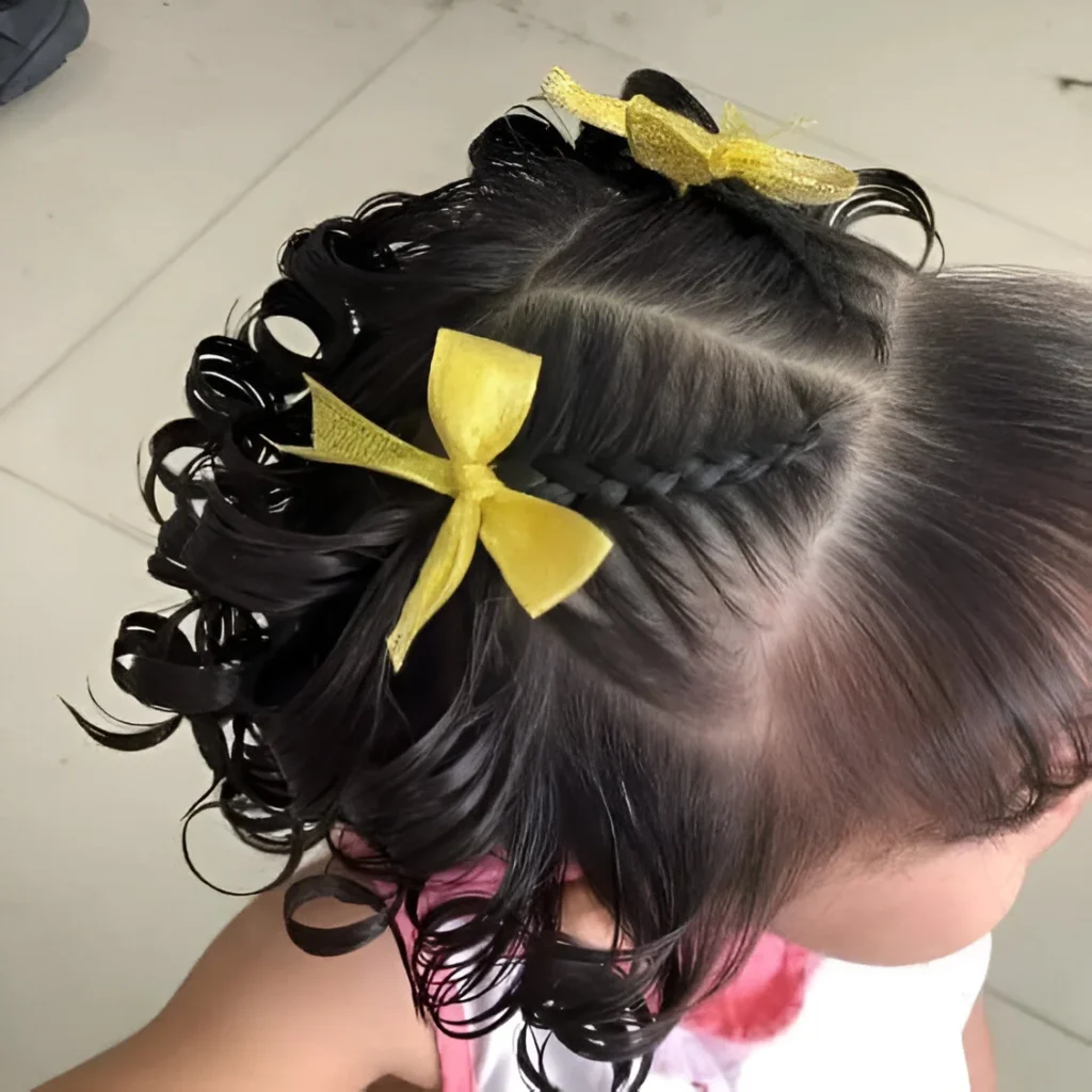 Little girl hairstyle with braids and curls; mixed texture hair.