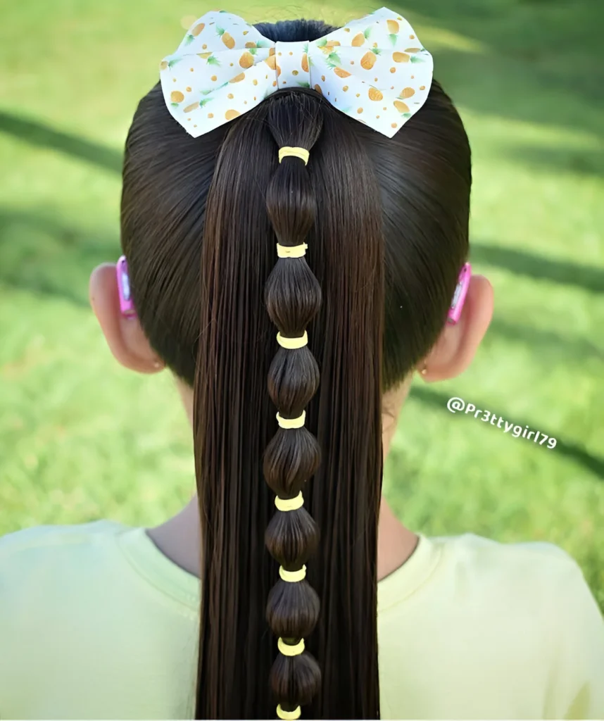 Sleek ponytail hairstyles for little girls; bubble ponytail.