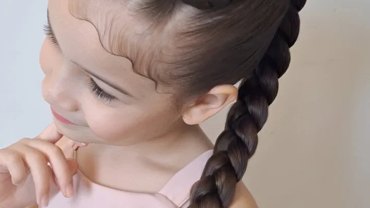 Elegant hairstyles for little girls; side braid with bow.