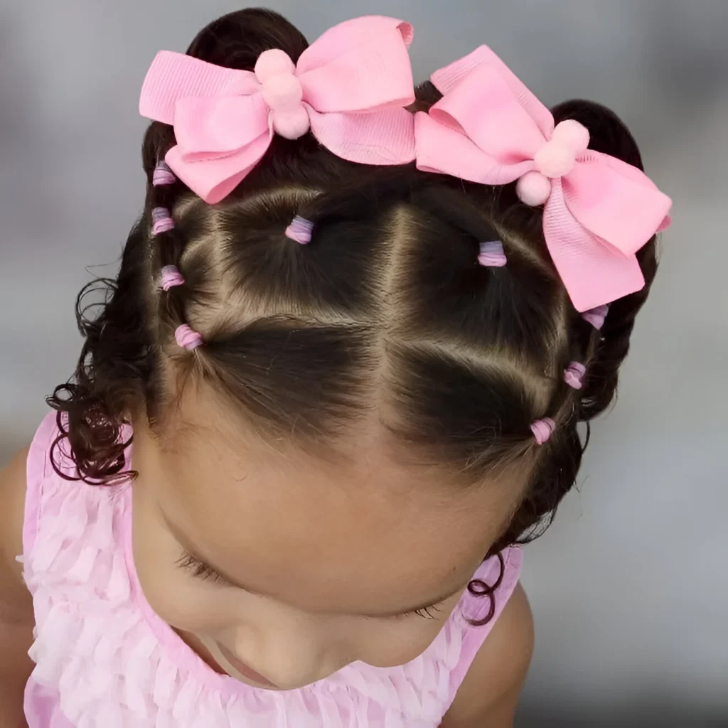 Little girl braided hairstyles; pigtail braids and bows.