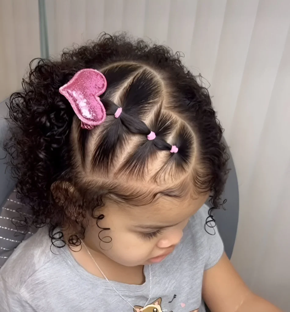 Creative hairstyles for little girls; heart-shaped hair design.