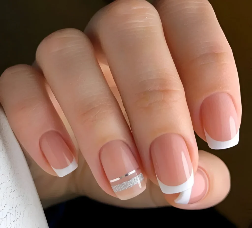 Simple French manicure nail designs with silver accent line.