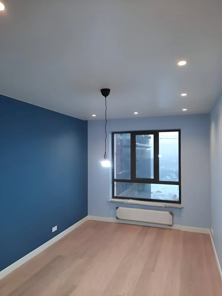 Classic blue accent wall in a modern room.