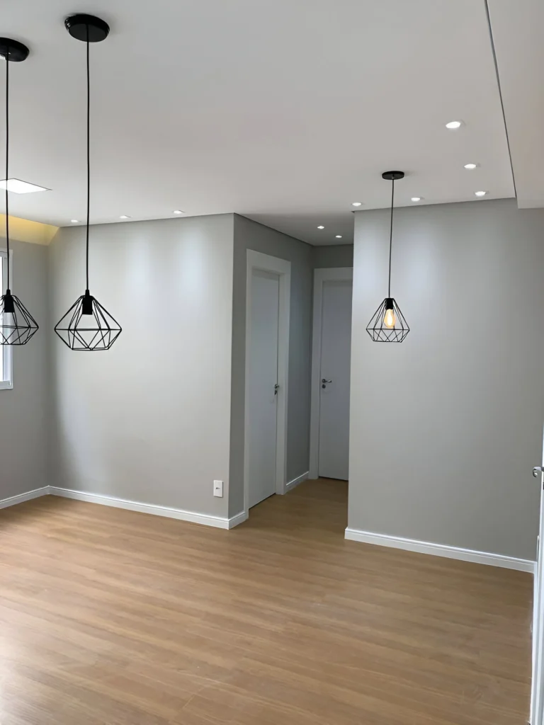 Light gray accent wall in open living space.