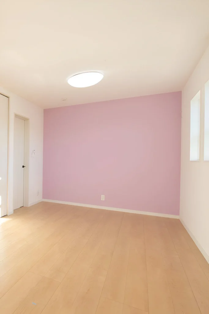 Accent wall in a calming pastel purple.