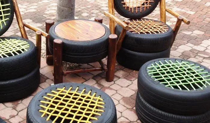 A large collection of upcycled tire pet beds in various colors and patterns.