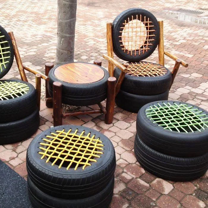 A large collection of upcycled tire pet beds in various colors and patterns.