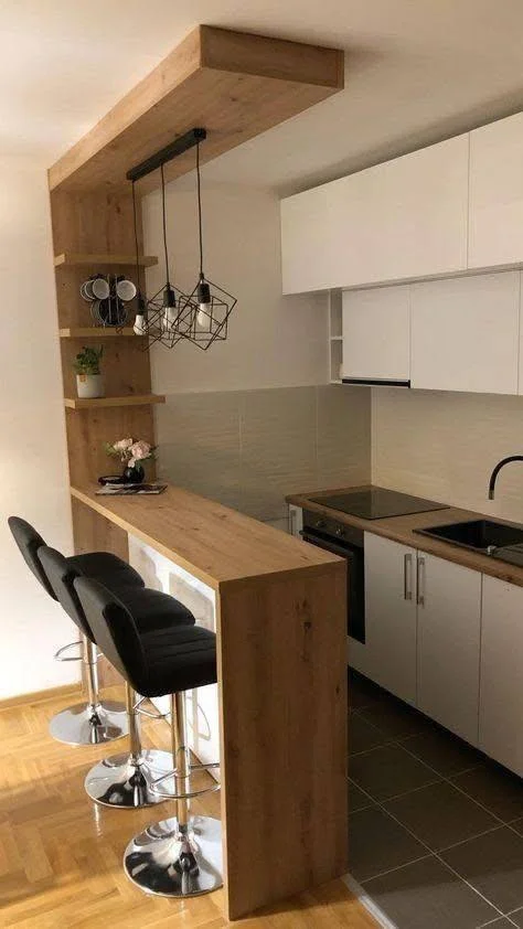 Wood kitchen bar with matching overhead shelf.